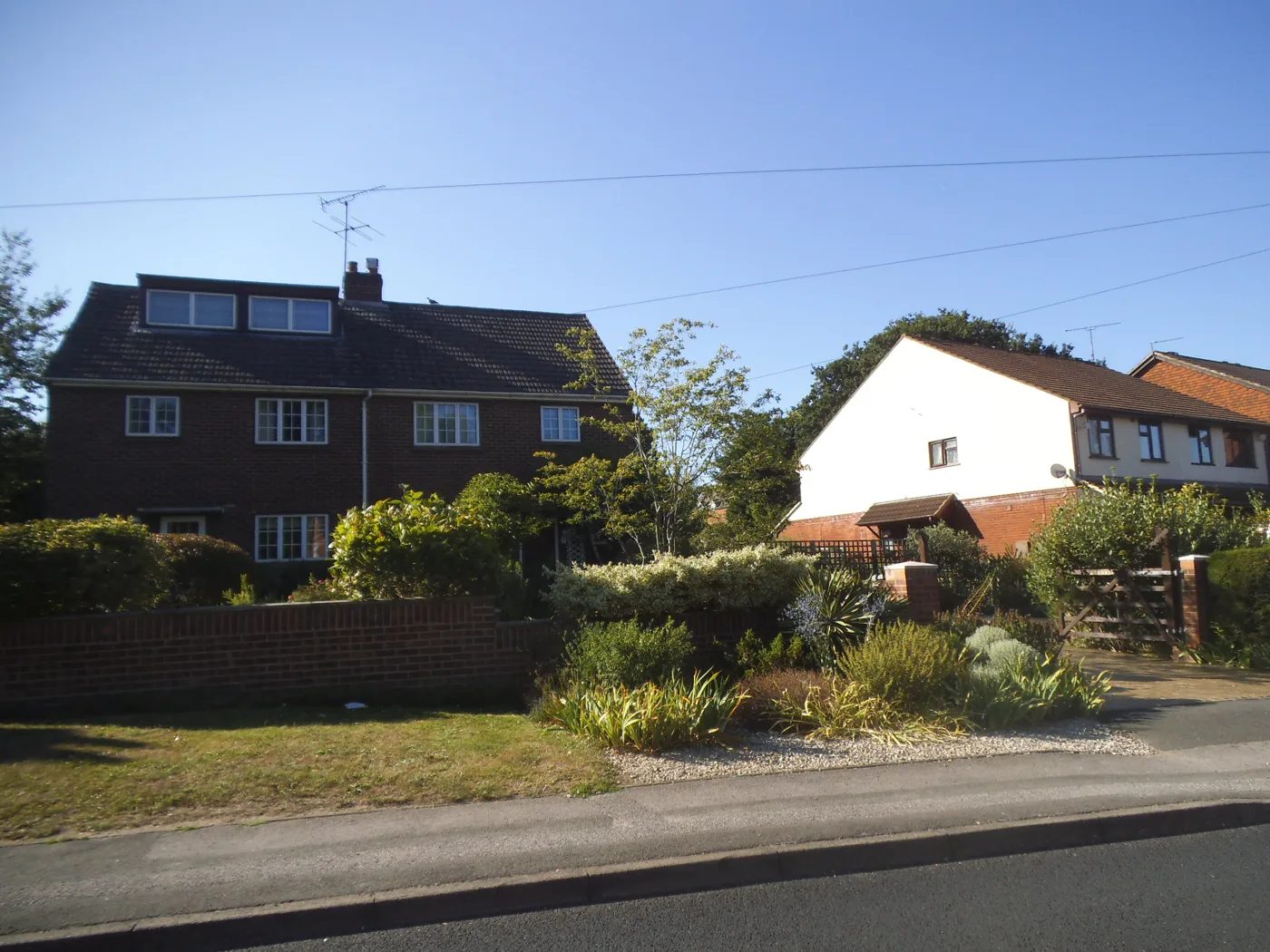 Houses on Broad Lane, Bracknell. Semi-detached homes in the borough were worth 0.9% more in June 2026 than a year earlier, while flats fell 2%.