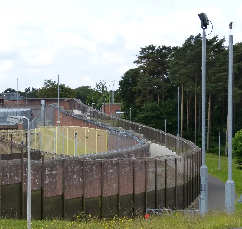 The perimeter fences and wall at Broadmoor Hospital, Crowthorne. The photo shows the secure boundary, not the sports pavilion itself